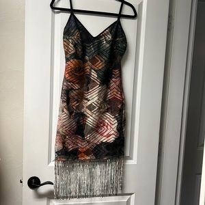 Floral print overlay bodycon party dress with fringe hemline